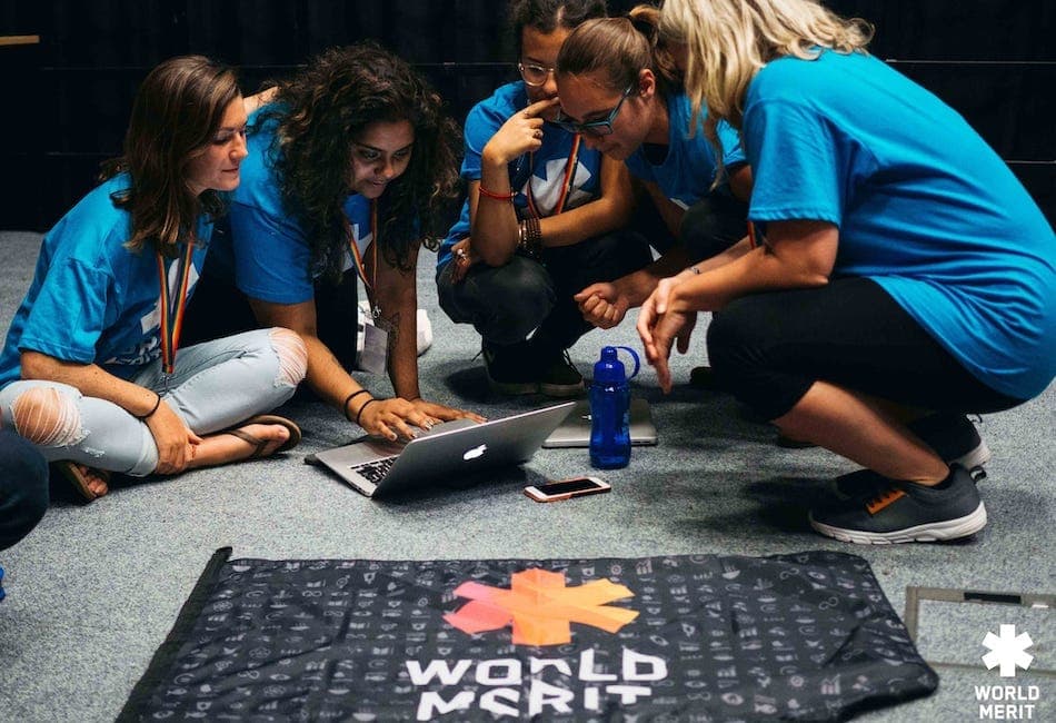 group looking at a computer